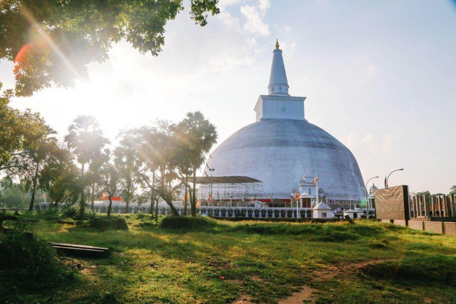 A white stupa at Anuradhapura in the low sun