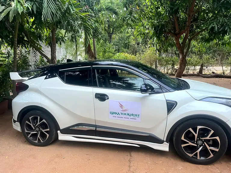 Lanka Tour Host Toyota C-HR with the company name on the door