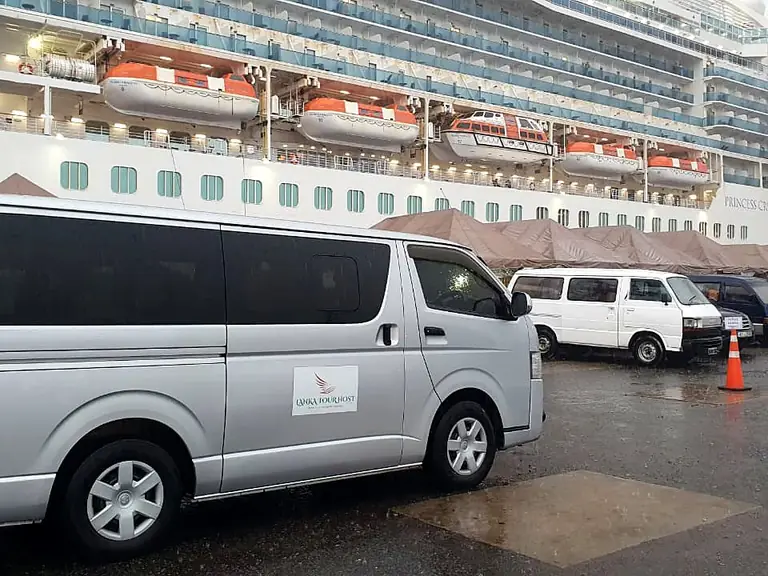 Lanka Tour Host van at Colombo port beside a cruise ship