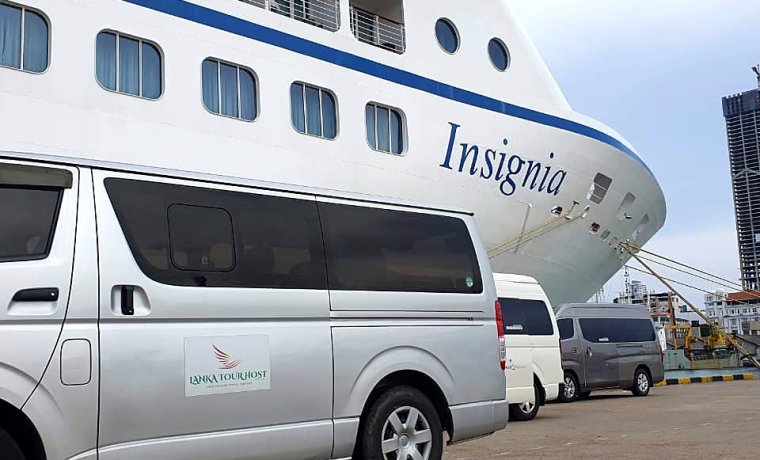 Lanka Tour Host van in front of a cruise ship in Colombo