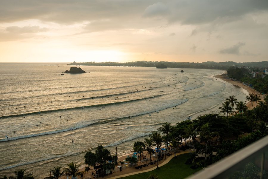 Weligama bay and beach at sunset